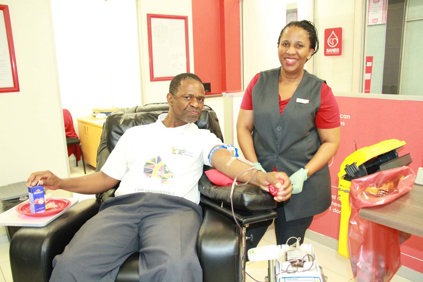 Why does SANBS charge for blood that people donate for free?